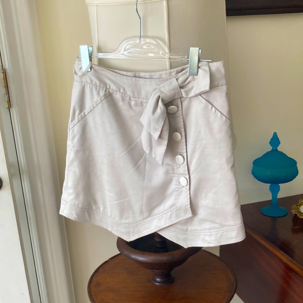 Light grey ultra suede skirt with bow and button details